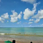 Pé na areia, sombra e agua fresca!